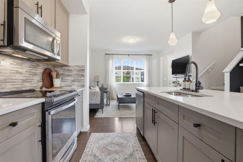 648 Walden Drive Se, Calgary, AB - Indoor Photo Showing Kitchen With Upgraded Kitchen