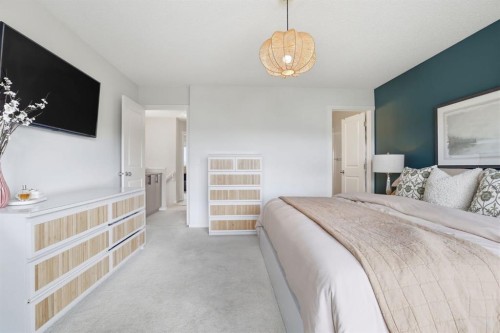 648 Walden Drive Se, Calgary, AB - Indoor Photo Showing Bedroom