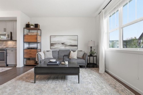 648 Walden Drive Se, Calgary, AB - Indoor Photo Showing Living Room