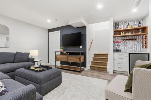 648 Walden Drive Se, Calgary, AB - Indoor Photo Showing Living Room