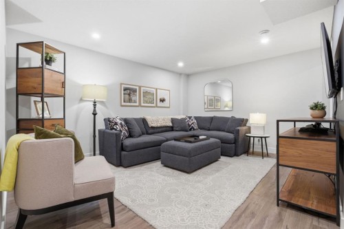 648 Walden Drive Se, Calgary, AB - Indoor Photo Showing Living Room