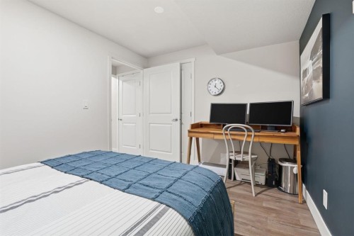 648 Walden Drive Se, Calgary, AB - Indoor Photo Showing Bedroom