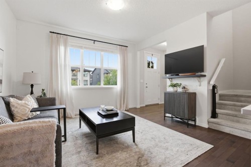 648 Walden Drive Se, Calgary, AB - Indoor Photo Showing Living Room