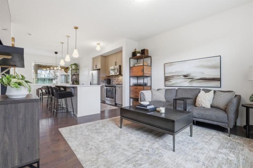 648 Walden Drive Se, Calgary, AB - Indoor Photo Showing Living Room