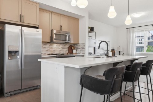 648 Walden Drive Se, Calgary, AB - Indoor Photo Showing Kitchen With Upgraded Kitchen