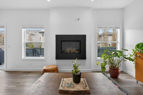1091 Brightoncrest Green Se, Calgary, AB - Indoor Photo Showing Living Room With Fireplace