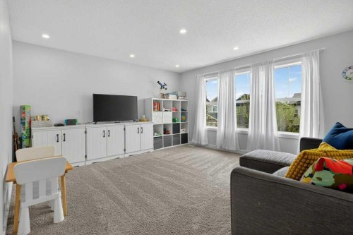 1091 Brightoncrest Green Se, Calgary, AB - Indoor Photo Showing Living Room