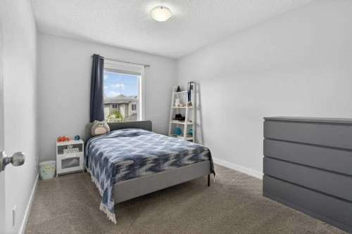 1091 Brightoncrest Green Se, Calgary, AB - Indoor Photo Showing Bedroom
