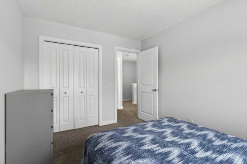 1091 Brightoncrest Green Se, Calgary, AB - Indoor Photo Showing Bedroom