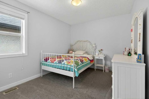 1091 Brightoncrest Green Se, Calgary, AB - Indoor Photo Showing Bedroom