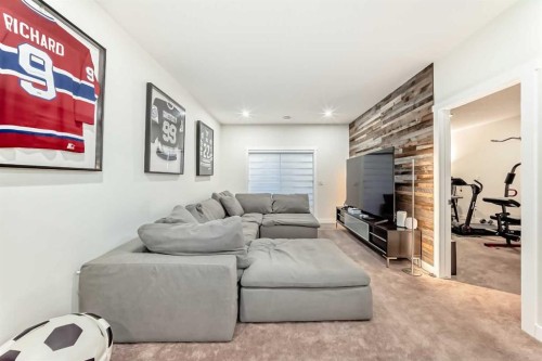 7 Wolf Crescent, Okotoks, AB - Indoor Photo Showing Living Room With Fireplace
