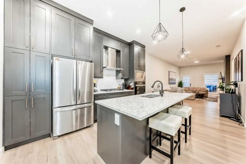 7 Wolf Crescent, Okotoks, AB - Indoor Photo Showing Kitchen With Stainless Steel Kitchen With Upgraded Kitchen