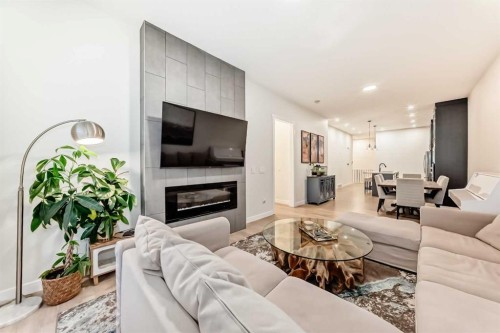7 Wolf Crescent, Okotoks, AB - Indoor Photo Showing Living Room With Fireplace