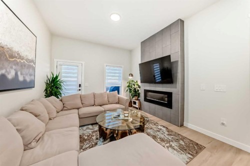 7 Wolf Crescent, Okotoks, AB - Indoor Photo Showing Living Room With Fireplace