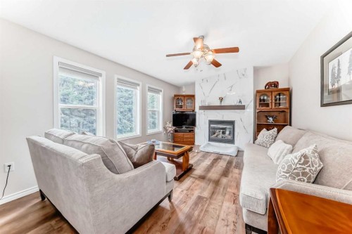 1 Ridge Drive, Rural Ponoka County, AB - Indoor Photo Showing Living Room With Fireplace