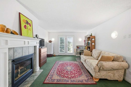 18 Varsity Estates Park Nw, Calgary, AB - Indoor Photo Showing Living Room With Fireplace