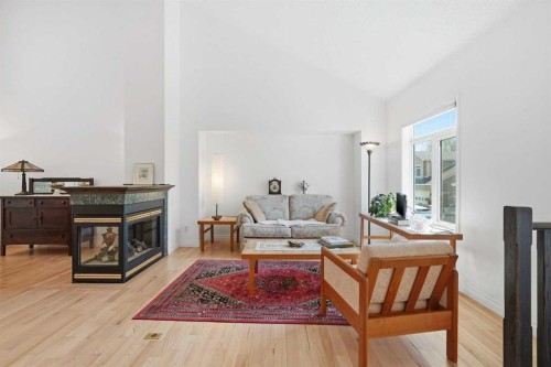 18 Varsity Estates Park Nw, Calgary, AB - Indoor Photo Showing Living Room With Fireplace