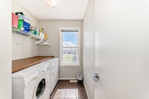 101 Copperstone Circle Se, Calgary, AB - Indoor Photo Showing Laundry Room