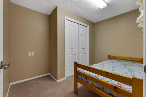 15 Saddletree Drive Ne, Calgary, AB - Indoor Photo Showing Bedroom