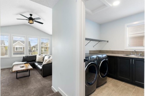 99 Ridge View Close, Cochrane, AB - Indoor Photo Showing Laundry Room
