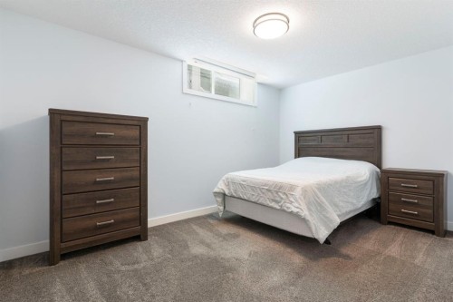 99 Ridge View Close, Cochrane, AB - Indoor Photo Showing Bedroom
