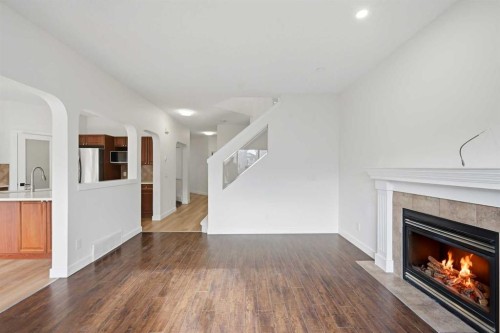 88 Saddletree Close Ne, Calgary, AB - Indoor Photo Showing Living Room With Fireplace