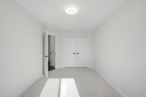 88 Saddletree Close Ne, Calgary, AB - Indoor Photo Showing Other Room
