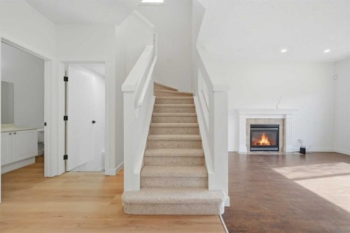 88 Saddletree Close Ne, Calgary, AB - Indoor With Fireplace