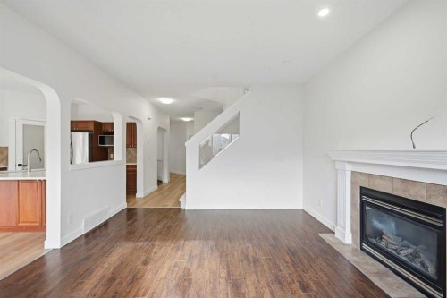 88 Saddletree Close Ne, Calgary, AB - Indoor Photo Showing Living Room With Fireplace