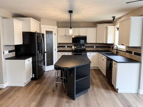 32 Carriere Crescent, Beaumont, AB - Indoor Photo Showing Kitchen With Double Sink