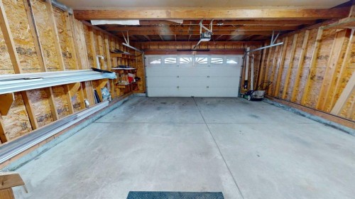 32 Carriere Crescent, Beaumont, AB - Indoor Photo Showing Garage