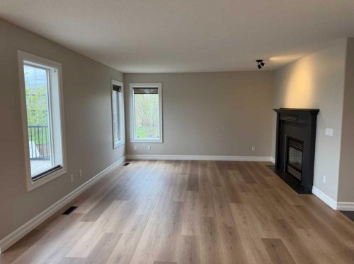 32 Carriere Crescent, Beaumont, AB - Indoor With Fireplace