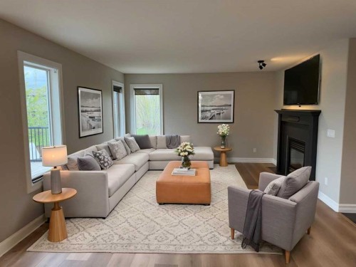 32 Carriere Crescent, Beaumont, AB - Indoor Photo Showing Living Room With Fireplace