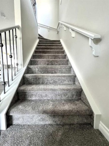 30 Emberside Link, Cochrane, AB - Indoor Photo Showing Other Room