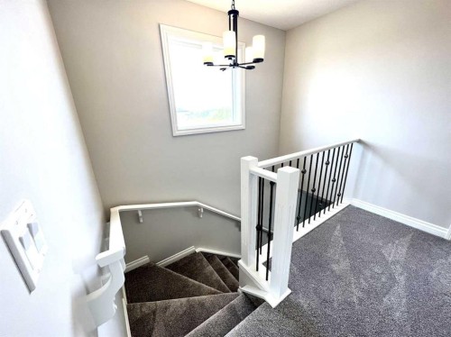 30 Emberside Link, Cochrane, AB - Indoor Photo Showing Other Room