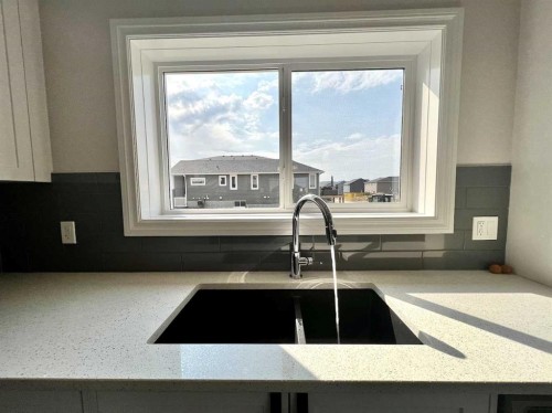 30 Emberside Link, Cochrane, AB - Indoor Photo Showing Kitchen