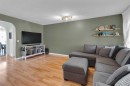 111 Arbour Meadows Close Nw, Calgary, AB  - Indoor Photo Showing Living Room 