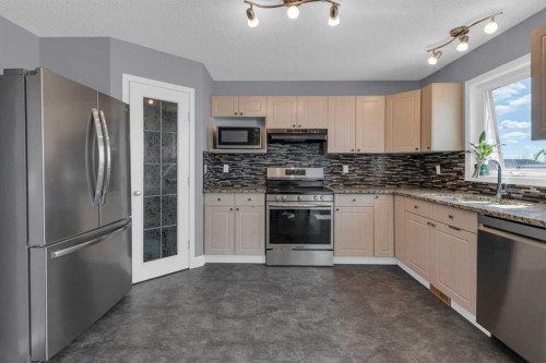 111 Arbour Meadows Close Nw, Calgary, AB - Indoor Photo Showing Kitchen With Stainless Steel Kitchen With Upgraded Kitchen