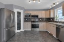 111 Arbour Meadows Close Nw, Calgary, AB  - Indoor Photo Showing Kitchen With Stainless Steel Kitchen With Upgraded Kitchen 