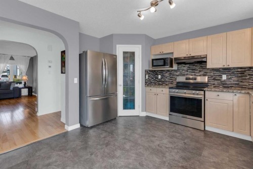 111 Arbour Meadows Close Nw, Calgary, AB - Indoor Photo Showing Kitchen With Stainless Steel Kitchen