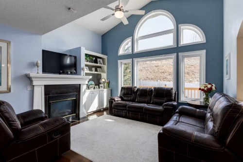 331 Sierra Madre Court Sw, Calgary, AB - Indoor Photo Showing Living Room With Fireplace