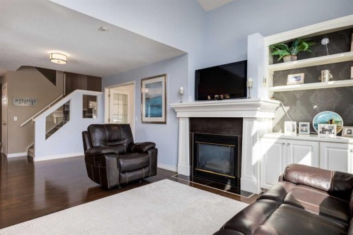331 Sierra Madre Court Sw, Calgary, AB - Indoor Photo Showing Living Room With Fireplace