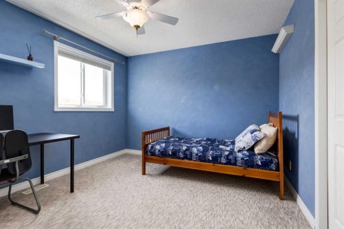 331 Sierra Madre Court Sw, Calgary, AB - Indoor Photo Showing Bedroom