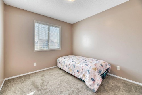319 Saddlebrook Circle Ne, Calgary, AB - Indoor Photo Showing Bedroom