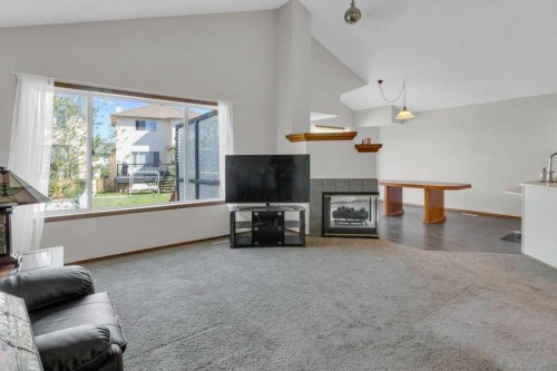24 Citadel Close Nw, Calgary, AB - Indoor Photo Showing Living Room With Fireplace