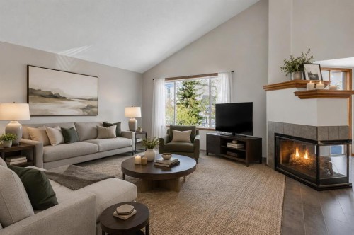 24 Citadel Close Nw, Calgary, AB - Indoor Photo Showing Living Room With Fireplace