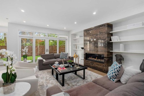 2620 14A Street Sw, Calgary, AB - Indoor Photo Showing Living Room With Fireplace