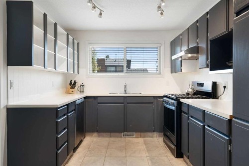 8 Hawkwood Place Nw, Calgary, AB - Indoor Photo Showing Kitchen With Upgraded Kitchen