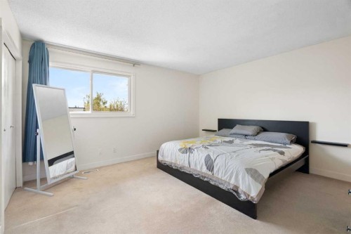8 Hawkwood Place Nw, Calgary, AB - Indoor Photo Showing Bedroom
