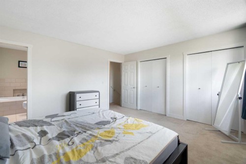 8 Hawkwood Place Nw, Calgary, AB - Indoor Photo Showing Bedroom